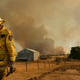 A Rural Fire Service firefighter Trevor Stewart views a flank of a fire on January 11, 2020, in Tumbarumba, Australia.